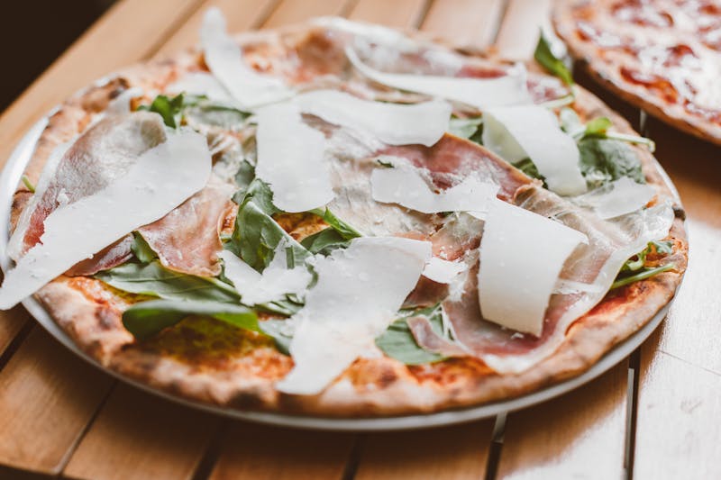 Truffle Prosciutto pizza with aged prosciutto and truffle oil