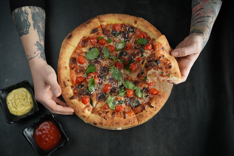 Buffalo Cauliflower vegan pizza with hot sauce glaze